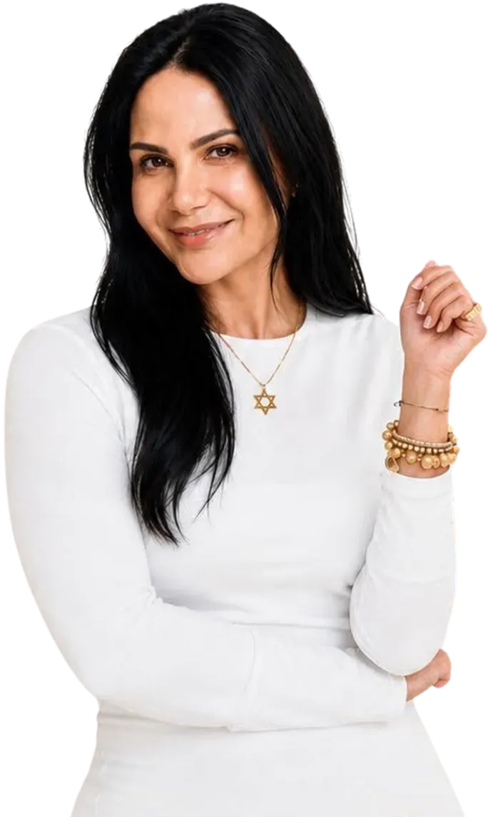 Portrait of Mika Harris, Ocala real estate broker, arm raised in a confident pose